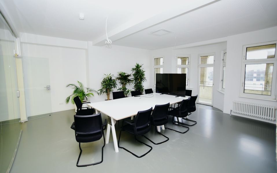 ** Modern top-floor room / coworking space **