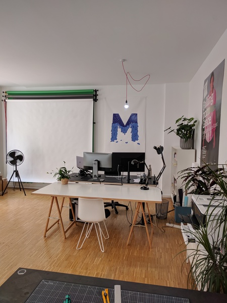 Large desk in a creative studio in Wedding