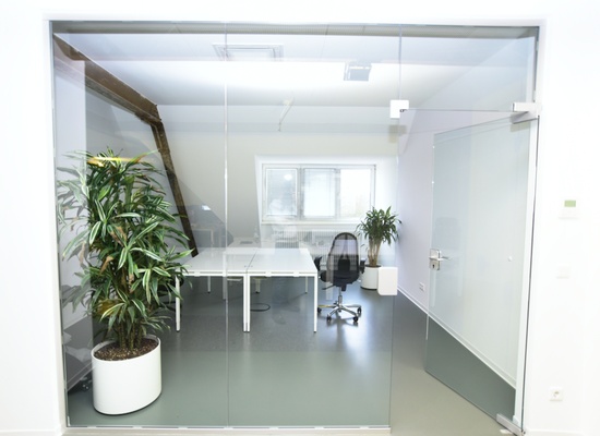 ** Modern top-floor room / coworking space **