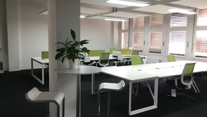 Spacious desks in sunny shared office at EUREF startup campus