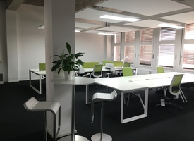 Spacious desks in sunny shared office at EUREF startup campus